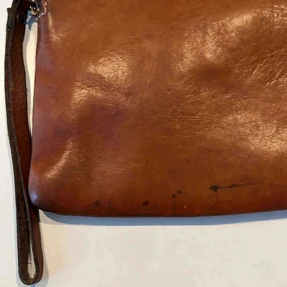 Patricia Nash Cassini Wristlet with tooled floral pattern in Florence Brown